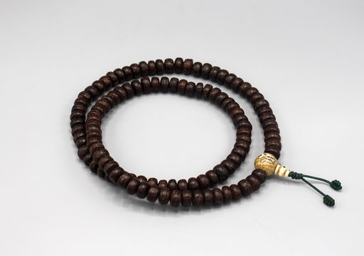 Cut Design Black Bodhi Seed 12 mm Flat Beads Prayer Mala with Counch Guru Beads - nepacrafts