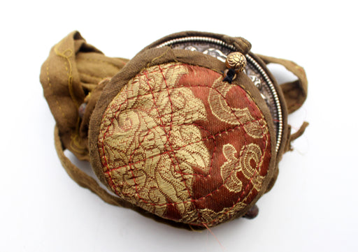 Round Hand Carved White Metal Manjushri Ghau Pendant with Cotton Cover - nepacrafts