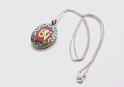 Oval Tibetan Kalachakra, Om and Buddha Eyes Pendant - nepacrafts
