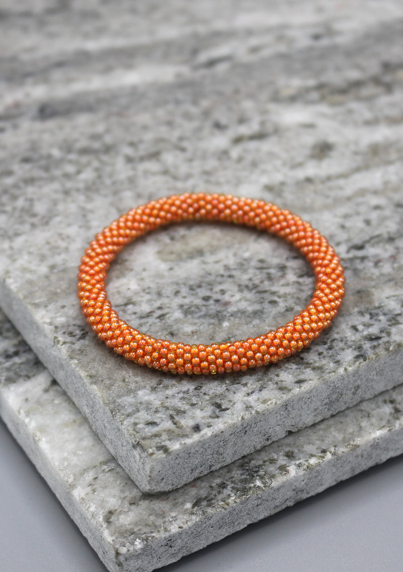 Bright Orange Glass Beads Roll on Bracelet - nepacrafts