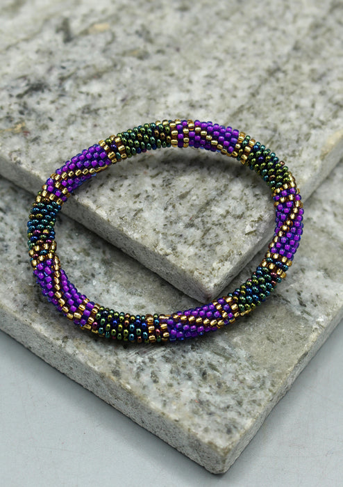Bright Purple and Golden Beads Nepalese Roll on Bracelet