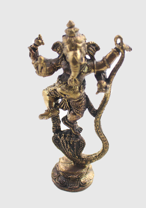 Dancing Ganesha on Snake Head Brass Statue - nepacrafts