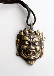 Brass Handcarved Mahakala Mini Pendant - nepacrafts