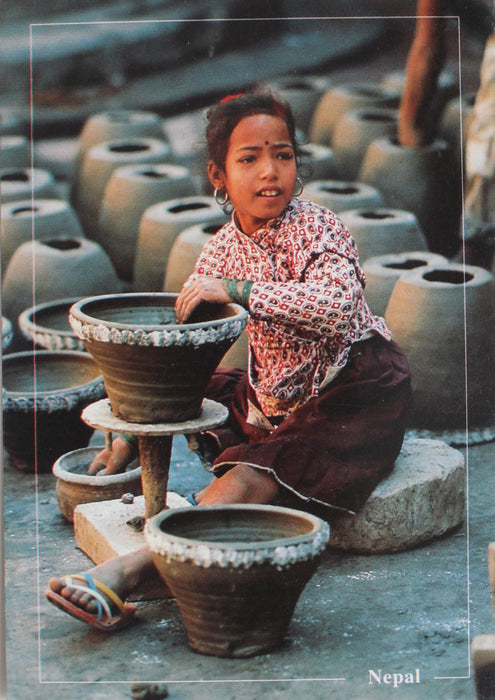 A Beautiful Pottress in Bhaktapur Postcard Nepal - nepacrafts