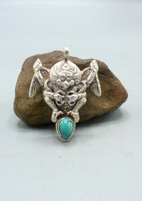 Sterling Silver Garuda Pendant with Inlaid Turquoise Stone