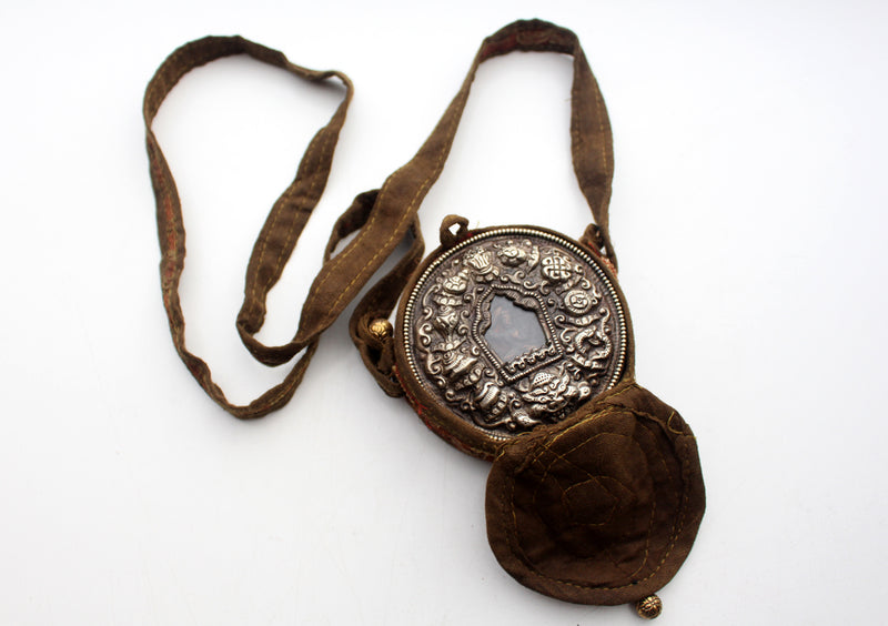 Round Hand Carved White Metal Manjushri Ghau Pendant with Cotton Cover - nepacrafts