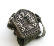 Hand Carved White Metal Manjushri Ghau Pendant - nepacrafts