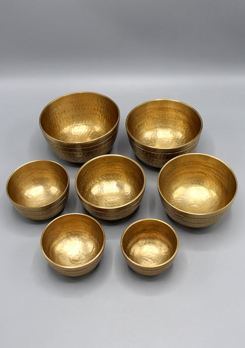 Set of Seven Hand Hammered Tibetan Singing Bowls