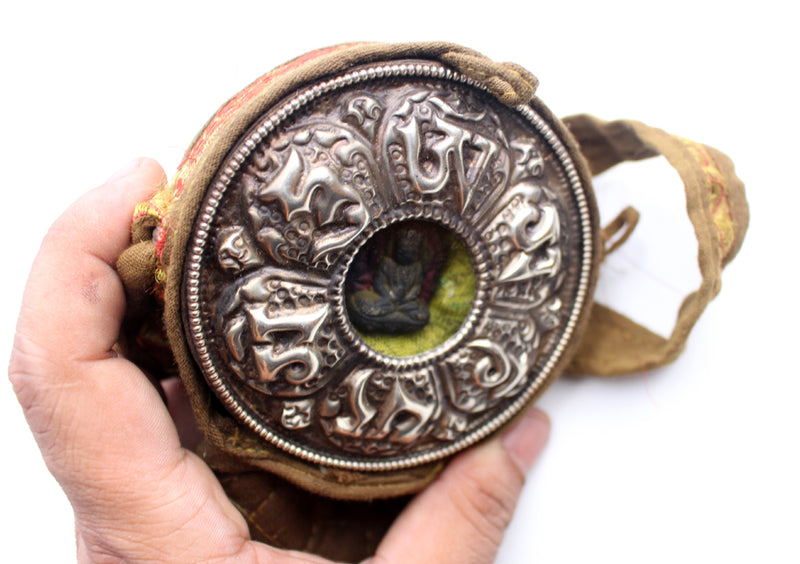 Hand Carved White Metal Amitabh Buddha Ghau Pendant in a Cotton Bag Cover - nepacrafts