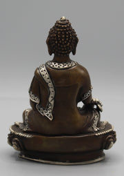 Finely carved Copper Medicine Buddha Statue inlaid Silver Robes - nepacrafts