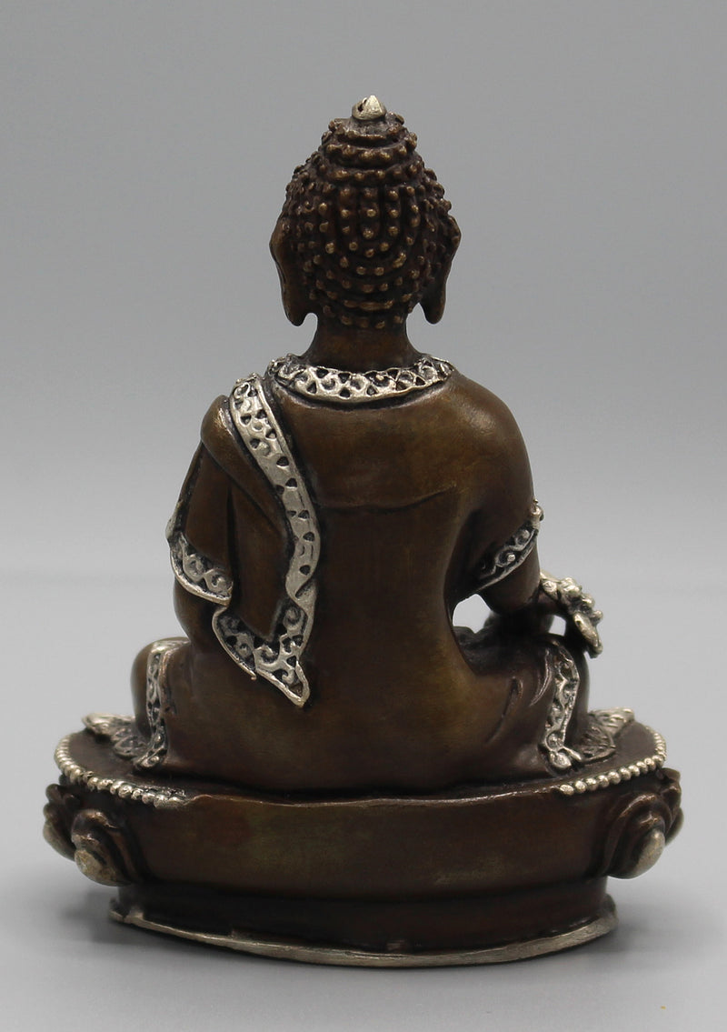 Finely carved Copper Medicine Buddha Statue inlaid Silver Robes - nepacrafts