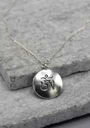 Tibetan Mandala and Om Carving Pendant - nepacrafts