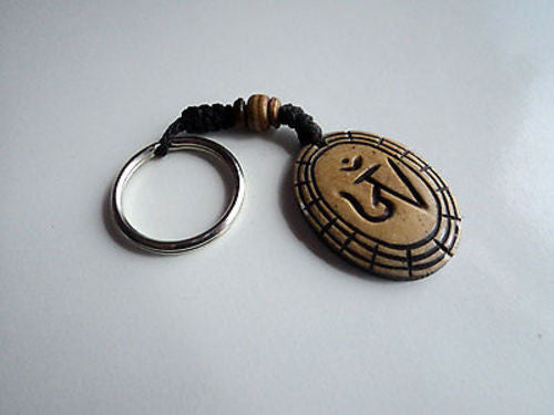 Brown Tibetan Om Bone Keychains - nepacrafts