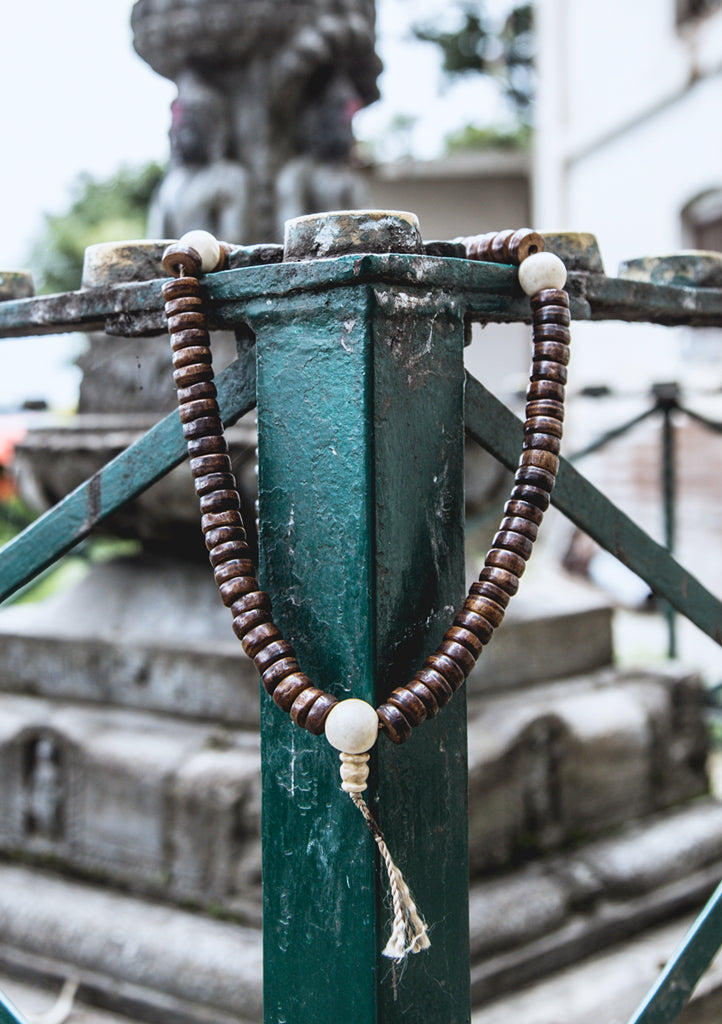 Disk Shaped Yak Bone Prayer Mala with White Conch Counter - nepacrafts