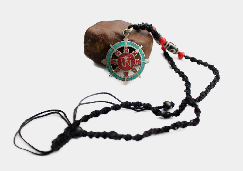 White Metal Tibetan Om Dharmachakra Pendant - nepacrafts