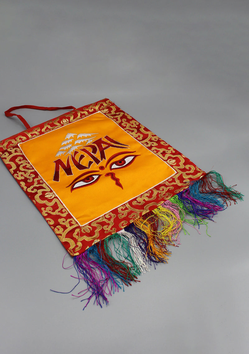 Brocade Framed Buddha Eyes and NEPAL Embroidery Wall Hanging