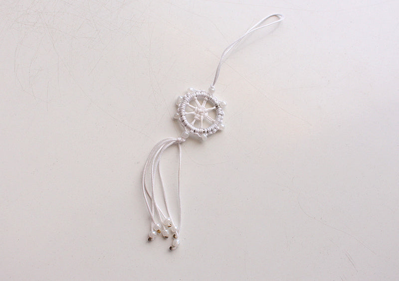 Beautiful Dharmachakra Car Hanging Amulet Decorated with Glass Beads - nepacrafts
