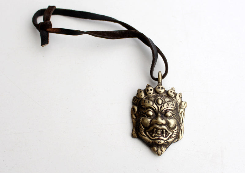Brass Handcarved Mahakala Mini Pendant - nepacrafts