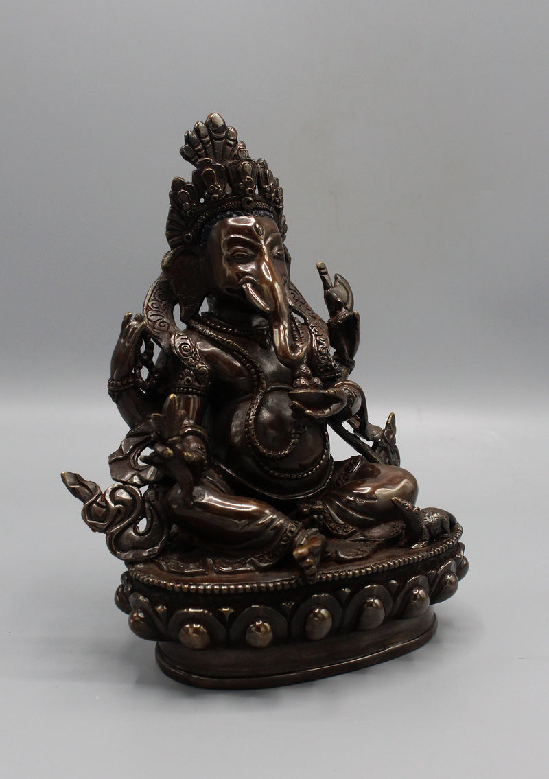 Copper Oxidized Four Armed Ganesha Statue