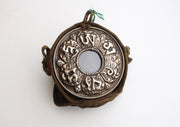 Om Mani Carved White Metal Shakyamuni Buddha Ghau Pendant in a Cotton Bag - nepacrafts
